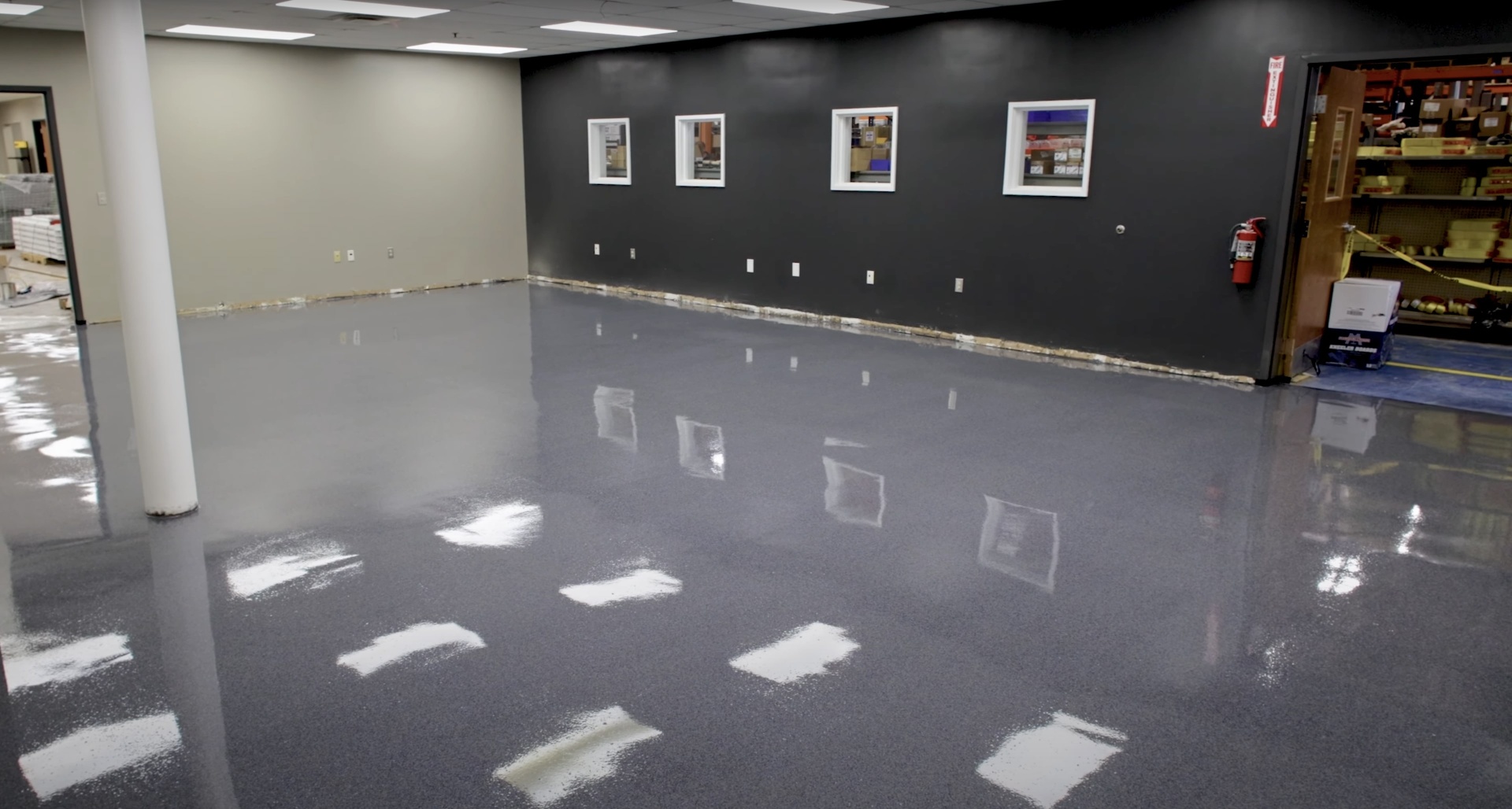 Polished concrete commercial floor with high-gloss finish in modern office space