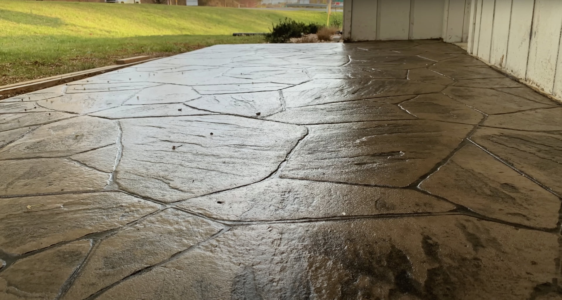 Cracked concrete driveway before professional repair in West Hartford