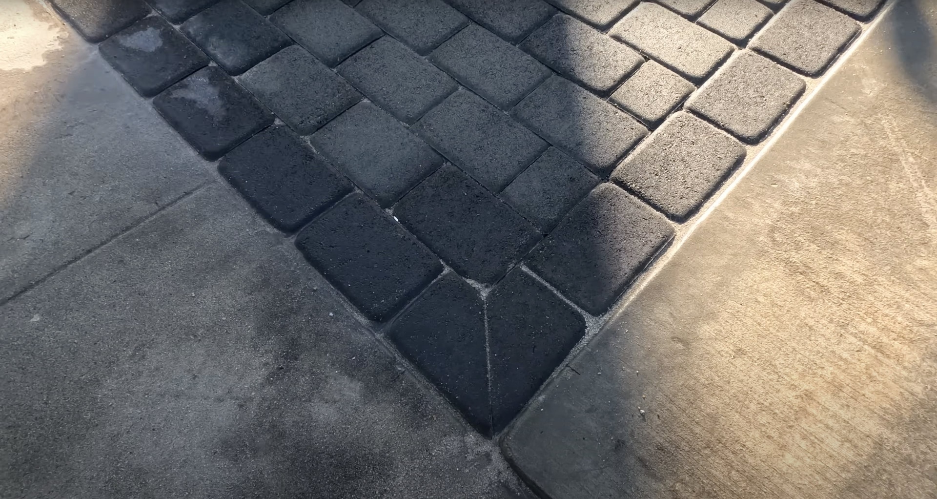 Detailed view of stamped concrete paver pattern showing precision and craftsmanship